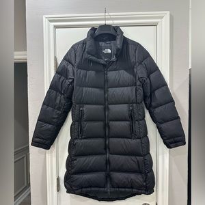 The North Face women’s black puffer coat